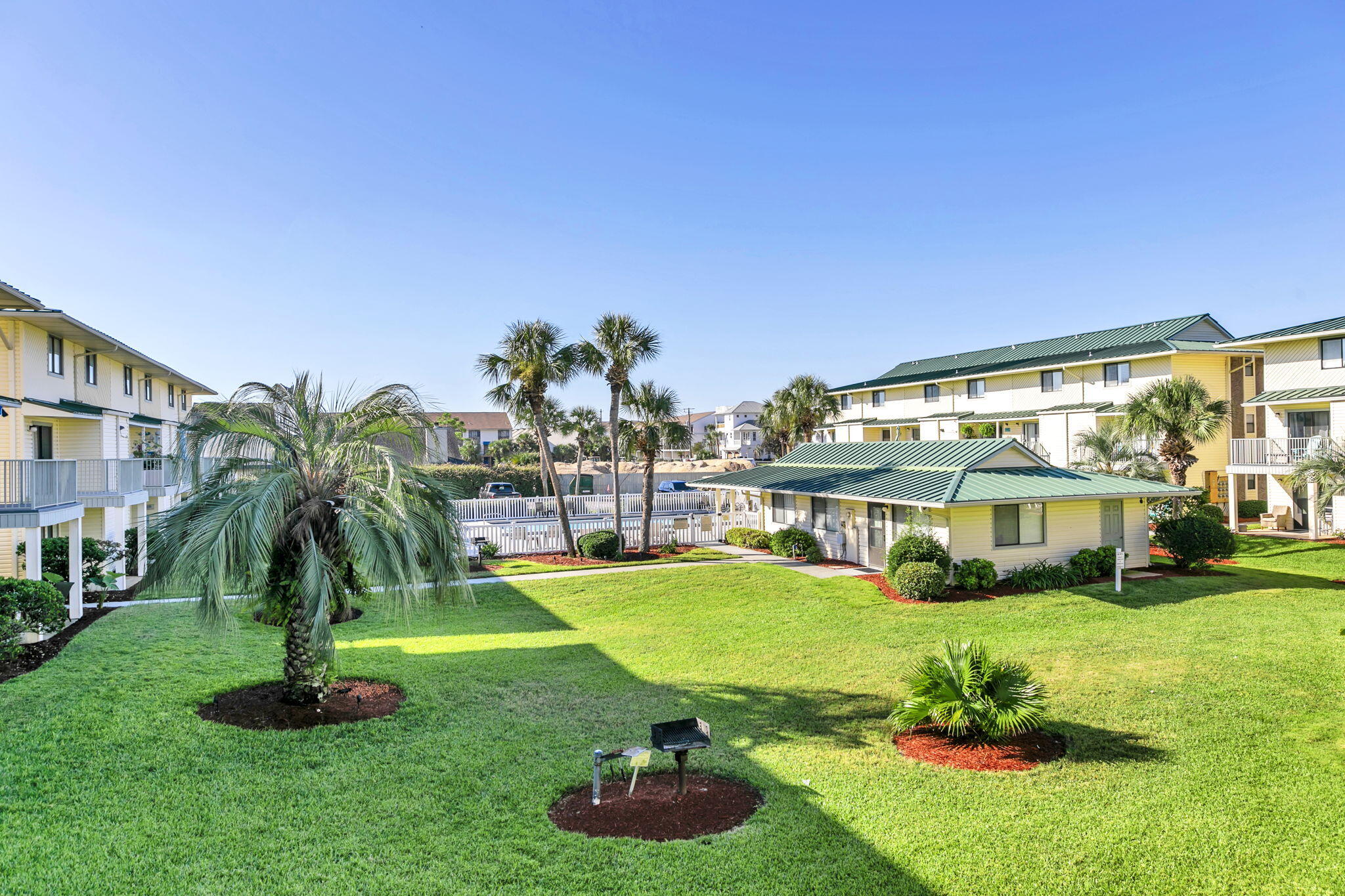 60 Sandprints Drive, Unit C12 Miramar Beach, FL 32550 - Photo 22 of 53 a view of a house with a big yard and potted plants