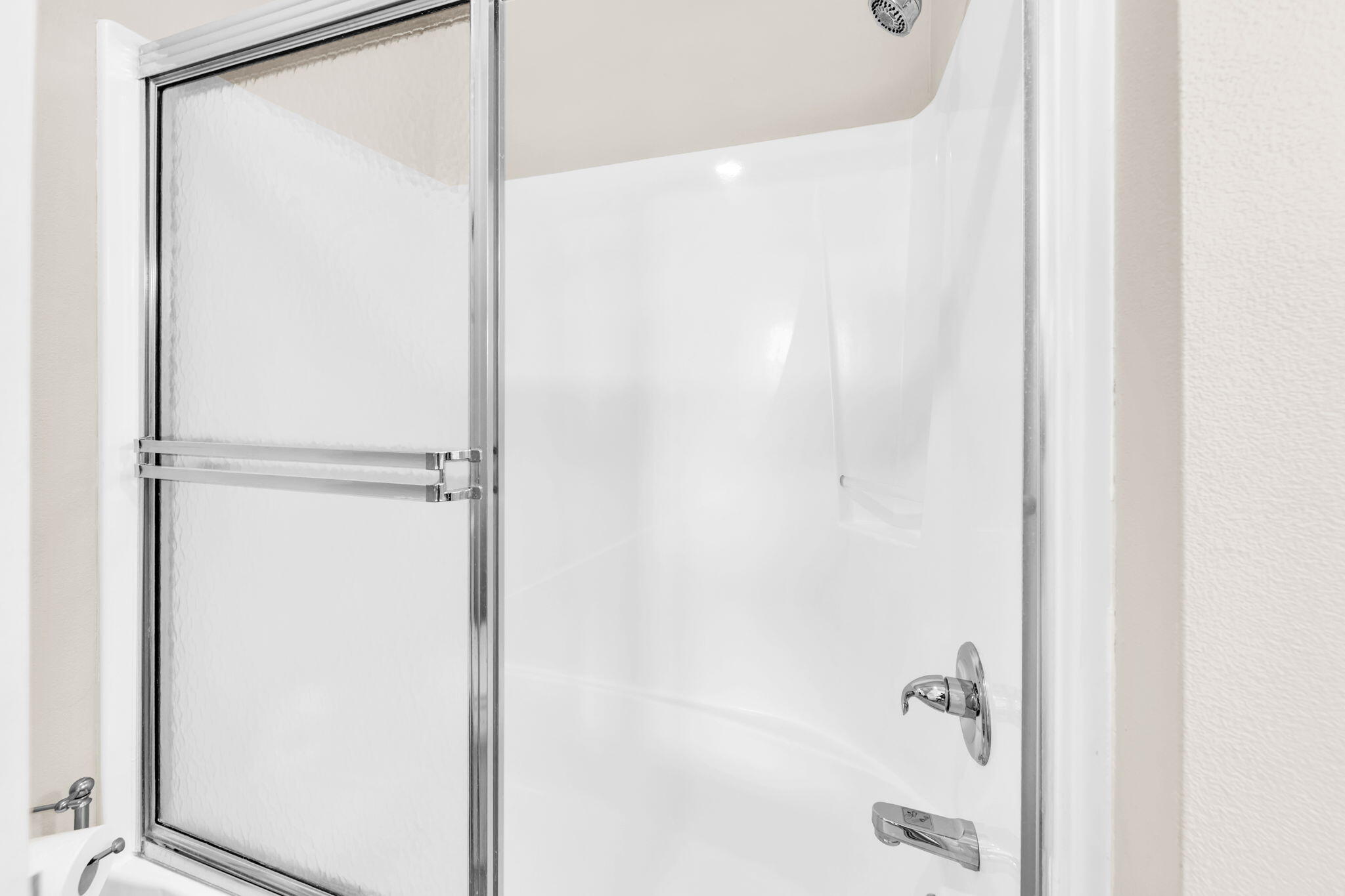 60 Sandprints Drive, Unit C12 Miramar Beach, FL 32550 - Photo 33 of 53 a bathroom with a glass shower door