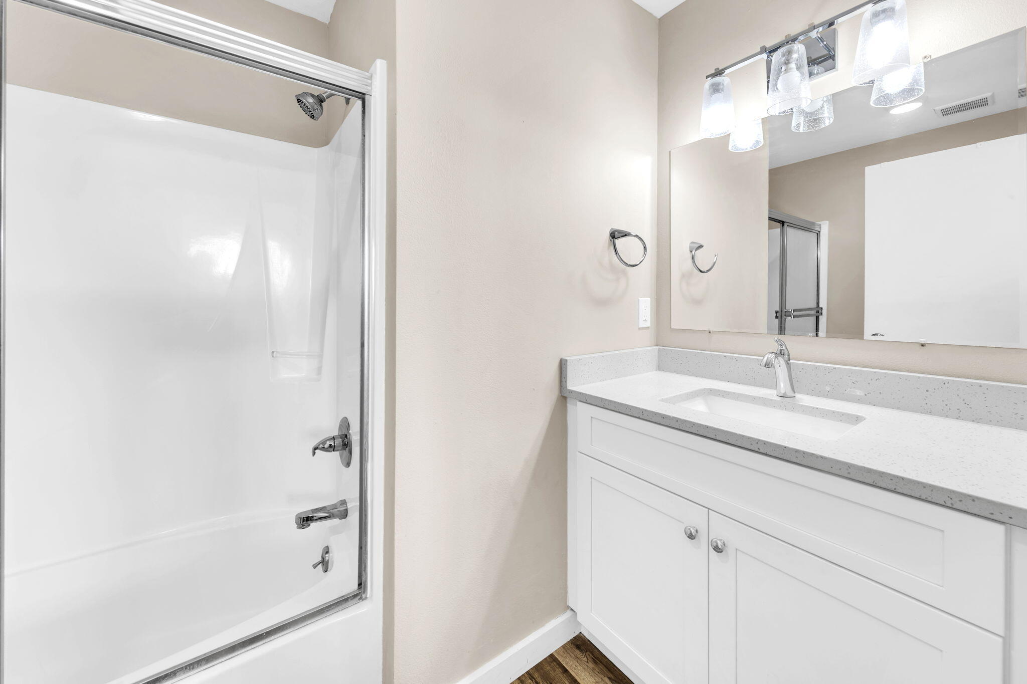 60 Sandprints Drive, Unit C12 Miramar Beach, FL 32550 - Photo 34 of 53 a bathroom with a shower sink and mirror