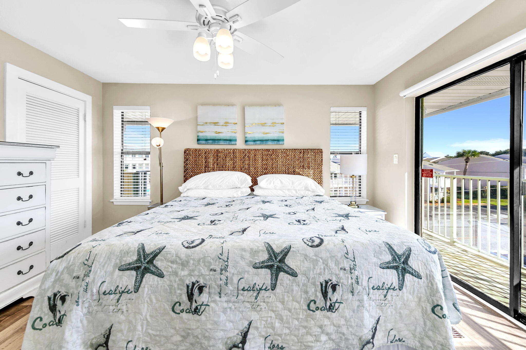 60 Sandprints Drive, Unit C12 Miramar Beach, FL 32550 - Photo 4 of 53 a bedroom with a large bed and a window