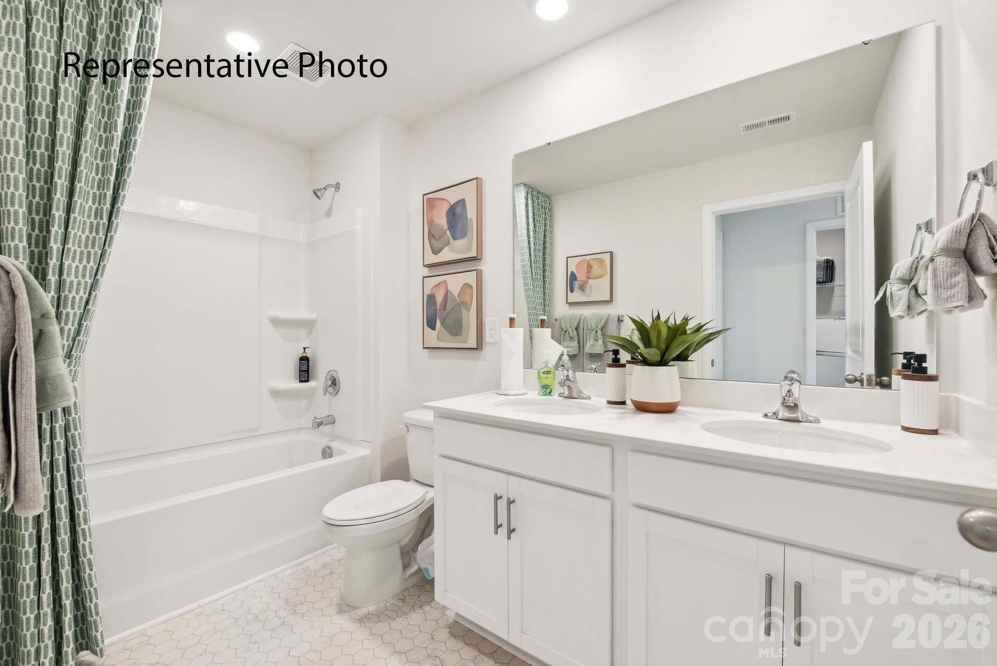 556 North Sparkleberry Street Chester, SC 29706 - Photo 25 of 26 a bathroom with a sink a toilet and a bathtub