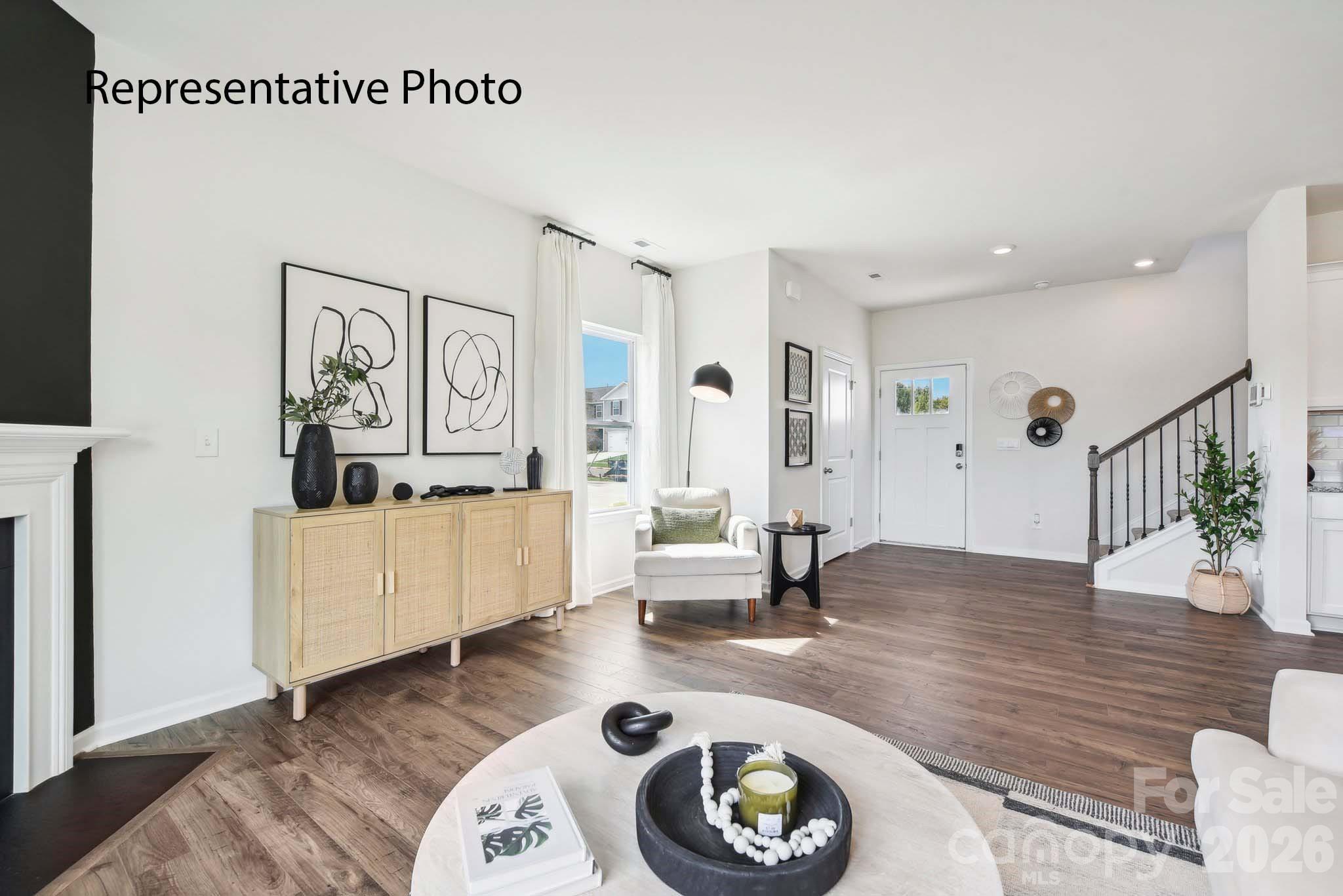 556 North Sparkleberry Street Chester, SC 29706 - Photo 3 of 26 a living room with furniture and a wooden floor