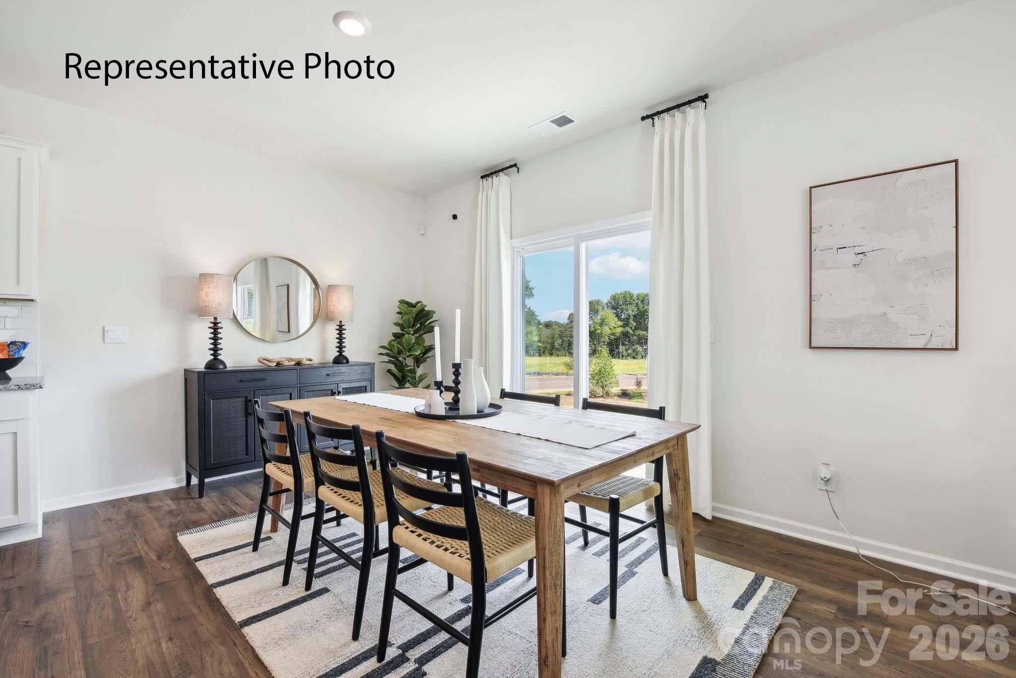 556 North Sparkleberry Street Chester, SC 29706 - Photo 7 of 26 a view of a dining room with furniture and window