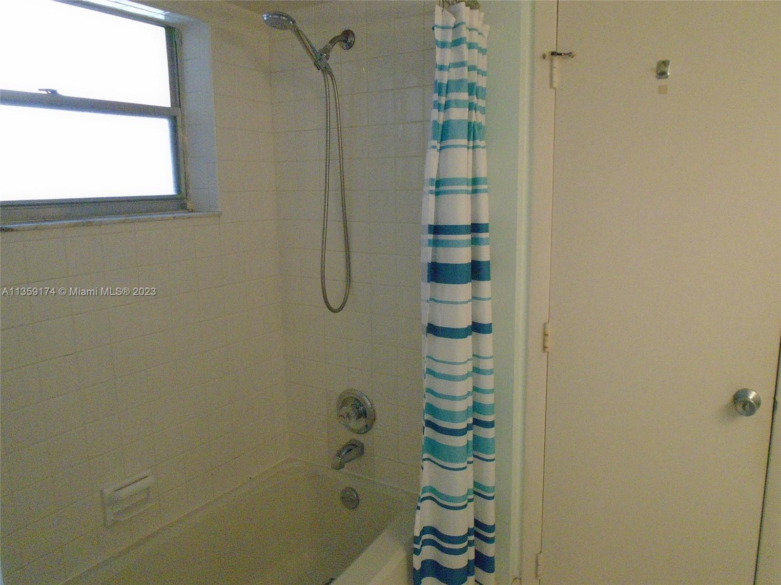 Sabal Palm of Pine Davie, FL 33324 - Photo 12 of 30 a bathroom with a shower and a sink