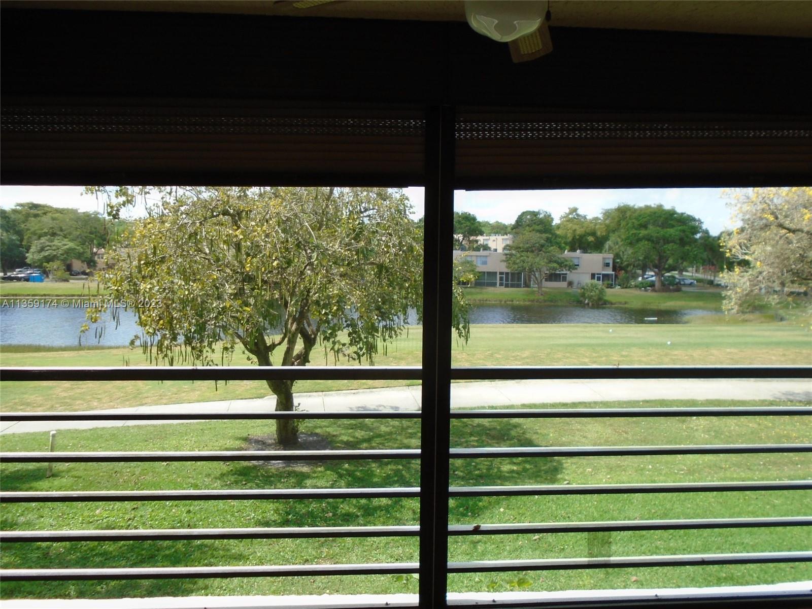 Sabal Palm of Pine Davie, FL 33324 - Photo 23 of 30 a view of outdoor space with swimming pool