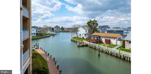 a view of a house with a lake view