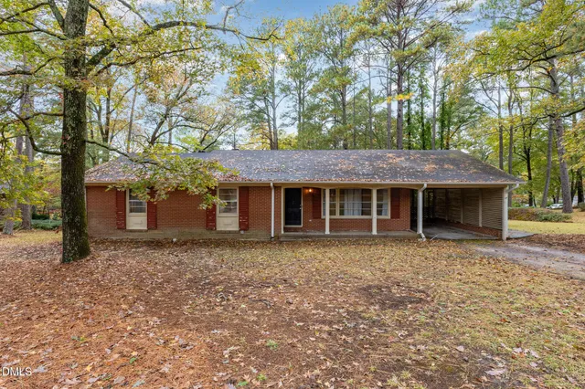 front view of a house with a dry yard