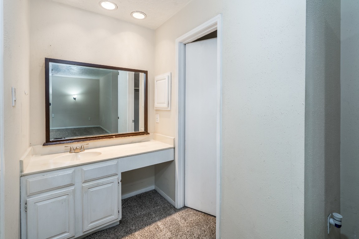 5018 Fitzwater Drive Spring, TX 77373 - Photo 20 of 27 Primary bathroom features a large vanity area.