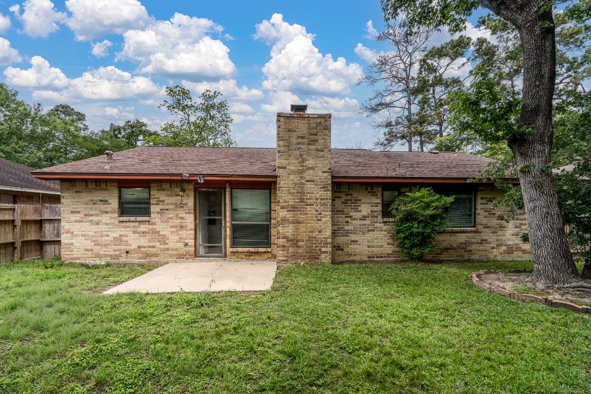 5018 Fitzwater Drive Spring, TX 77373 - Photo 6 of 27 Mature trees add character to the backyard.