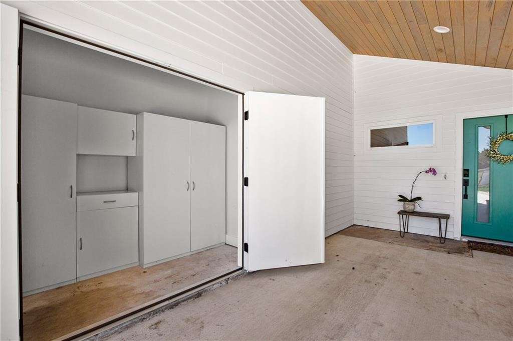 1128 Gardner Road, Unit B Austin, TX 78721 - Photo 21 of 25 Outdoor locked storage closet with shelving included.