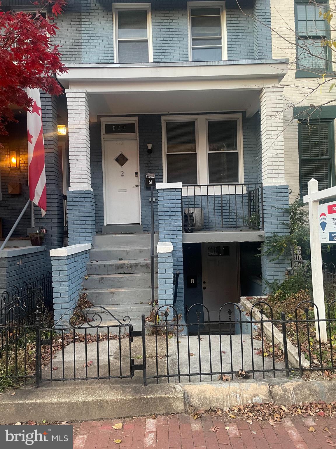 906 I Street Southeast, Unit 1 Washington, DC 20003 - Photo 19 of 19 a front view of a house with a porch