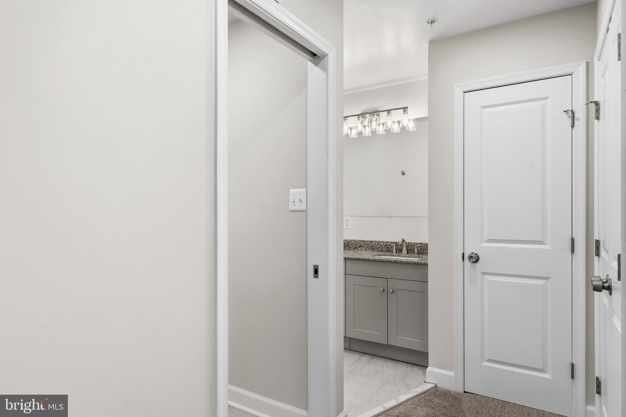 29725 Bruce Road Mechanicsville, MD 20659 - Photo 62 of 79 a bathroom with a granite countertop sink and a mirror