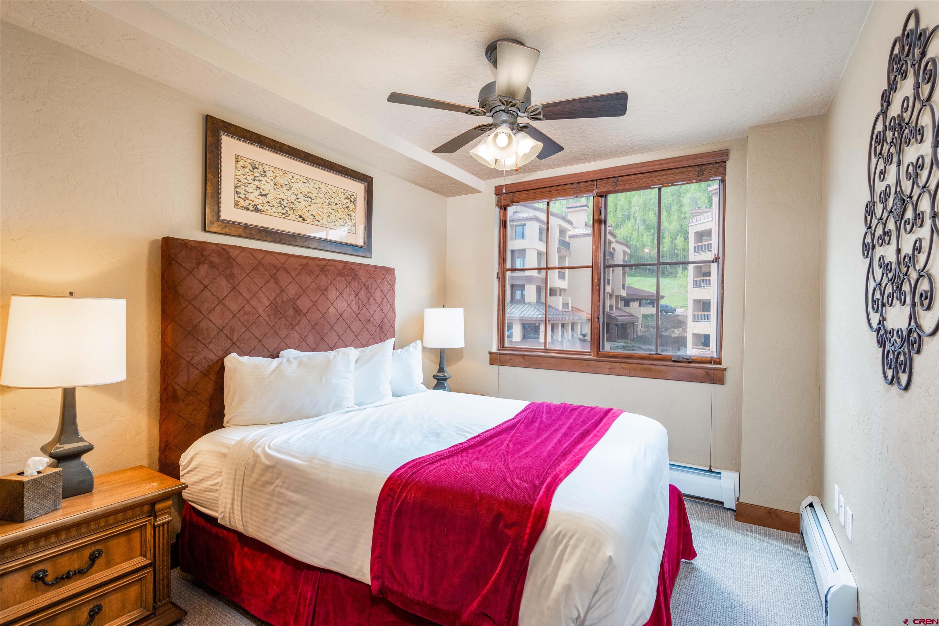 24 Sheol Street, Unit 204 Durango, CO 81301 - Photo 17 of 29 a bedroom with a bed and a window