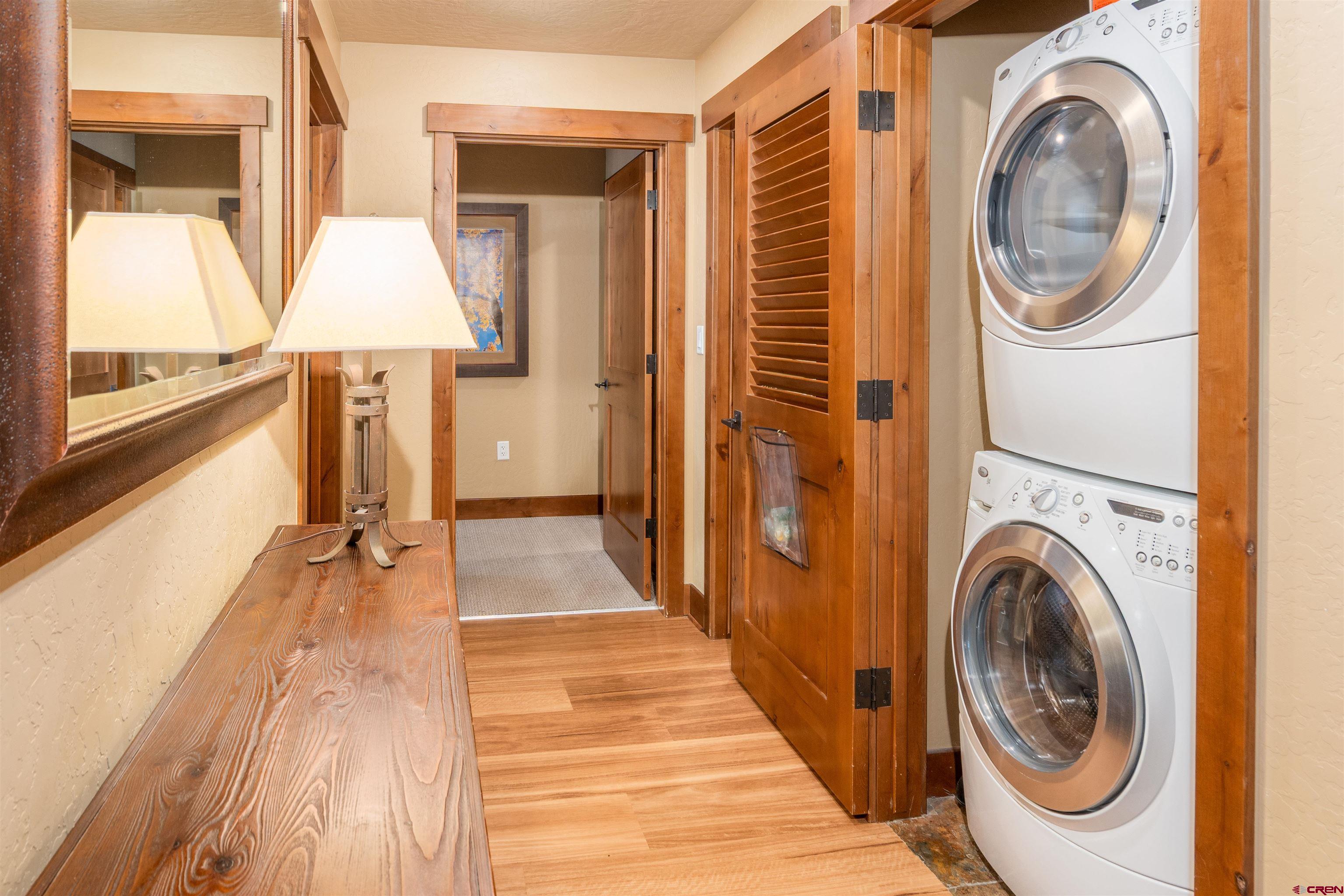 24 Sheol Street, Unit 204 Durango, CO 81301 - Photo 18 of 29 a view of a hallway with washer and dryer