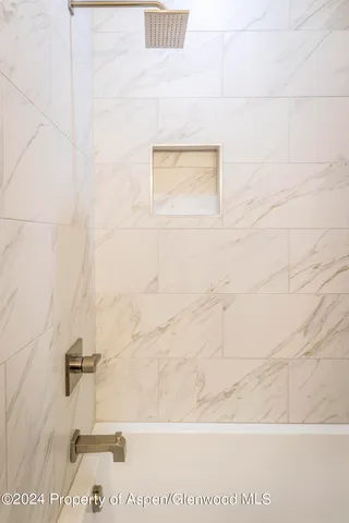 a bathroom with a bathtub