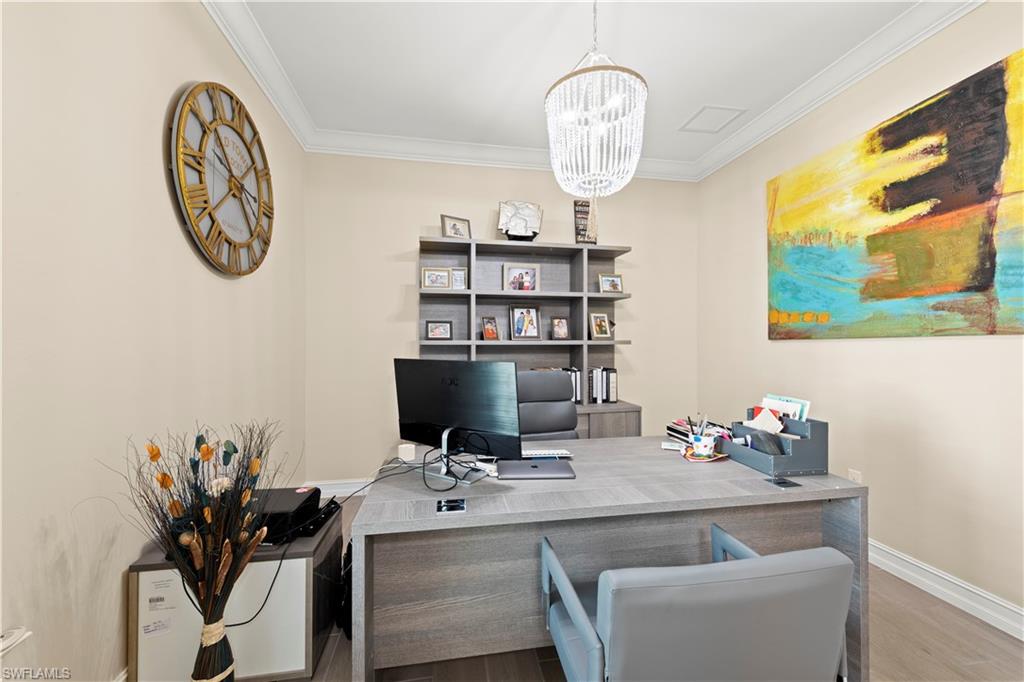 1608 Mockingbird Drive Naples, FL 34120 - Photo 15 of 29 a view of a workspace with furniture