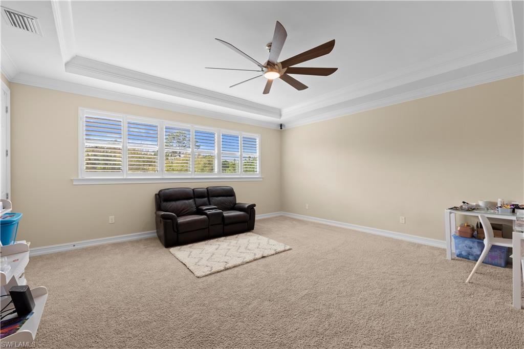 1608 Mockingbird Drive Naples, FL 34120 - Photo 21 of 29 a living room with furniture and a window