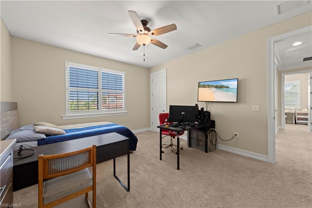 1608 Mockingbird Drive Naples, FL 34120 - Photo 26 of 29 a work room with furniture and windows