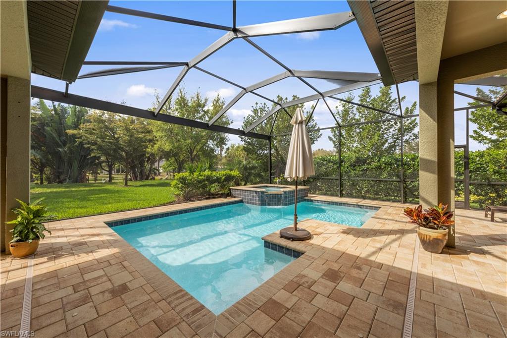 1608 Mockingbird Drive Naples, FL 34120 - Photo 4 of 29 a view of swimming pool with a patio