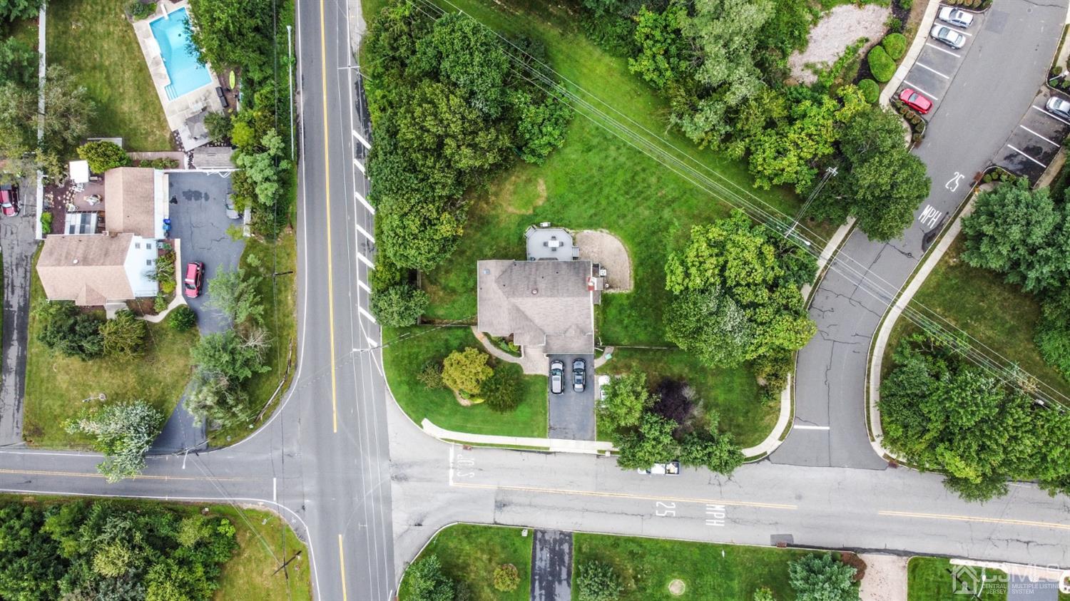 138 Disbrow Road Matawan, NJ 07747 - Photo 3 of 32 an aerial view of a house with a yard and garden