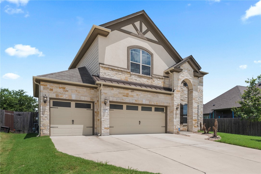 17309 Silent Harbor Loop Pflugerville, TX 78660 - Photo 1 of 1 a front view of a house with a yard