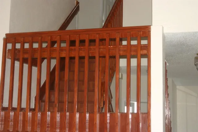 a view of a bathroom with wooden floor