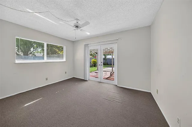 an empty room with windows