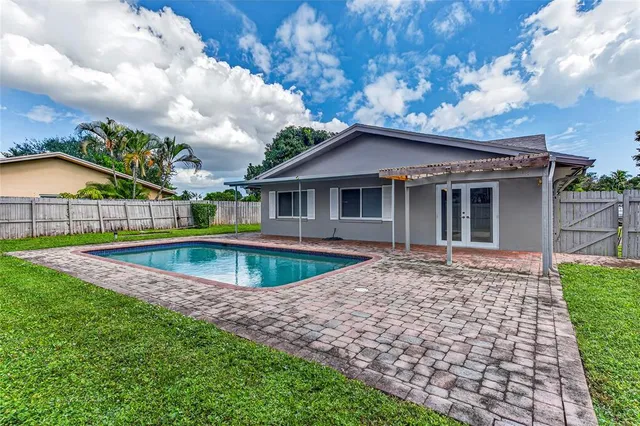 a view of outdoor space yard and swimming pool