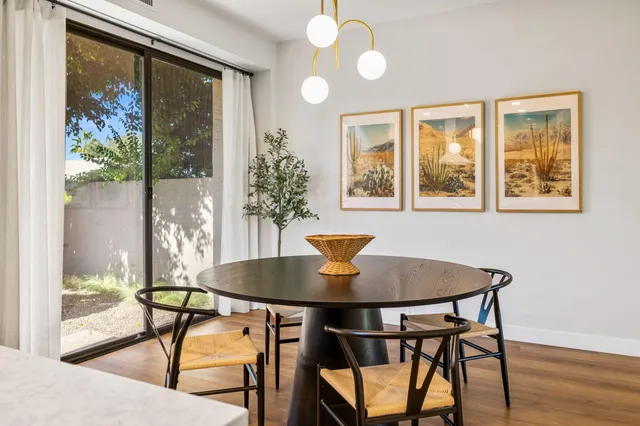 a bed room with a bed and a large window