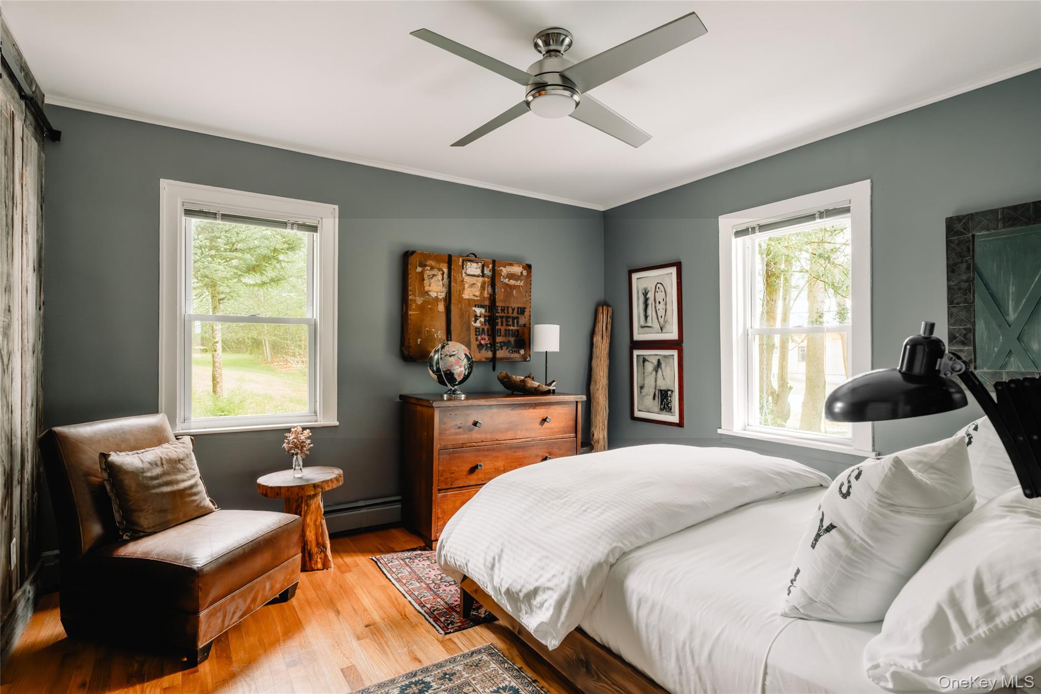 1680 Gulf Road North Branch, NY 12766 - Photo 14 of 45 Ground floor bedroom with multiple windows, custom barn doors over large closet.