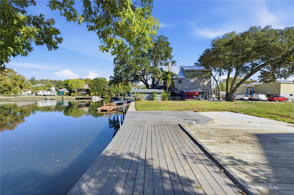 0 Circle Drive Weeki Wachee, FL 34607 - Photo 8 of 14 a view of a lake with houses