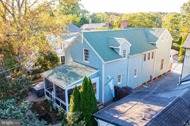 a view of a house with a roof deck