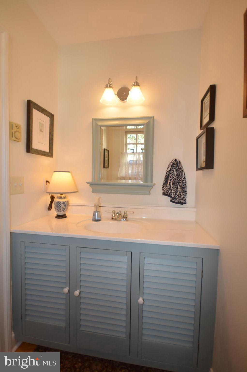 106 Grace Street St. Michaels, MD 21663 - Photo 36 of 57 a bedroom with a bed and a window