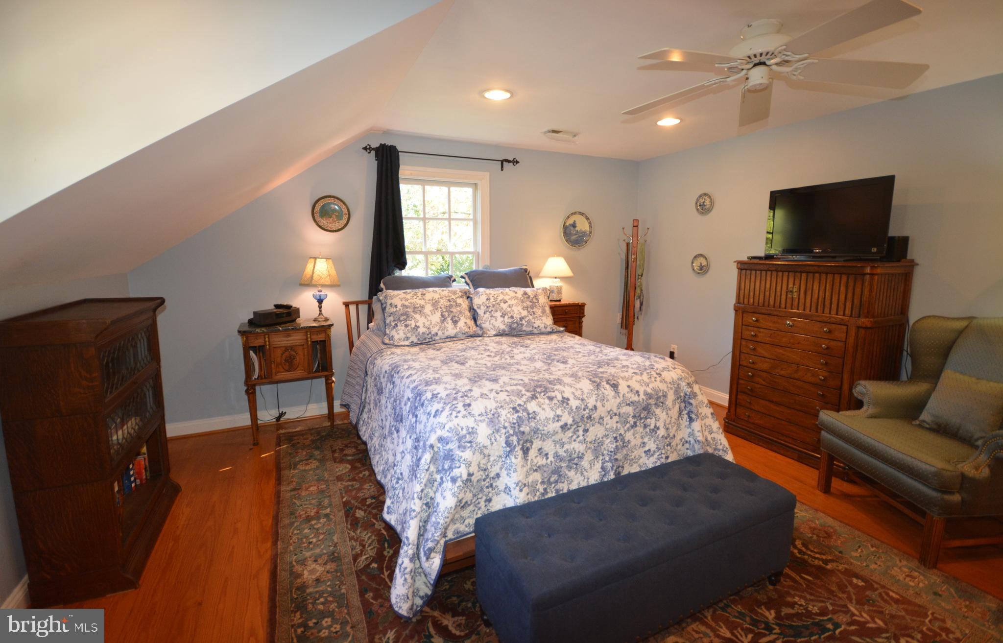 106 Grace Street St. Michaels, MD 21663 - Photo 41 of 57 a living room with furniture and a flat screen tv
