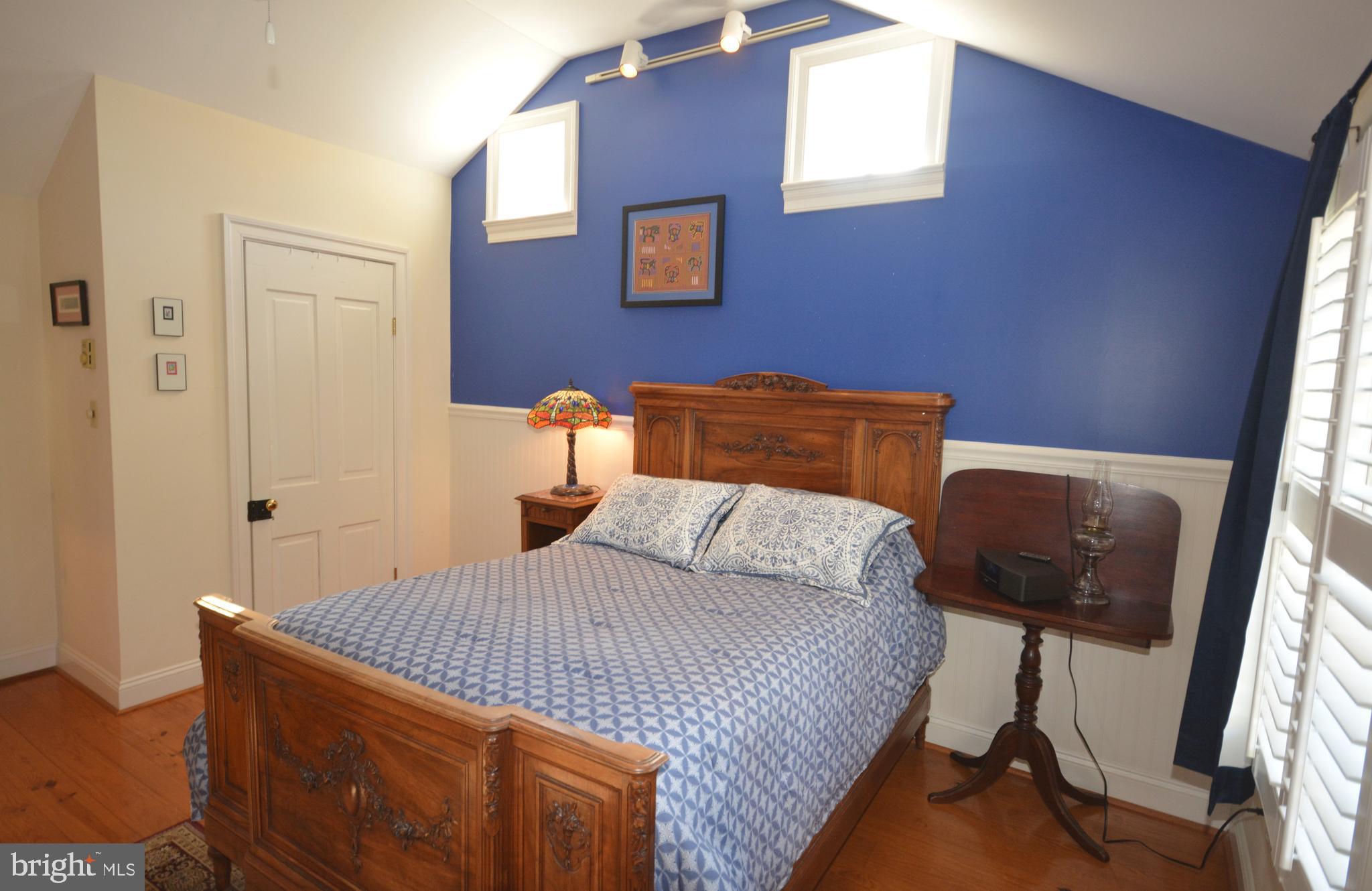 106 Grace Street St. Michaels, MD 21663 - Photo 45 of 57 a bedroom with a bed and a window