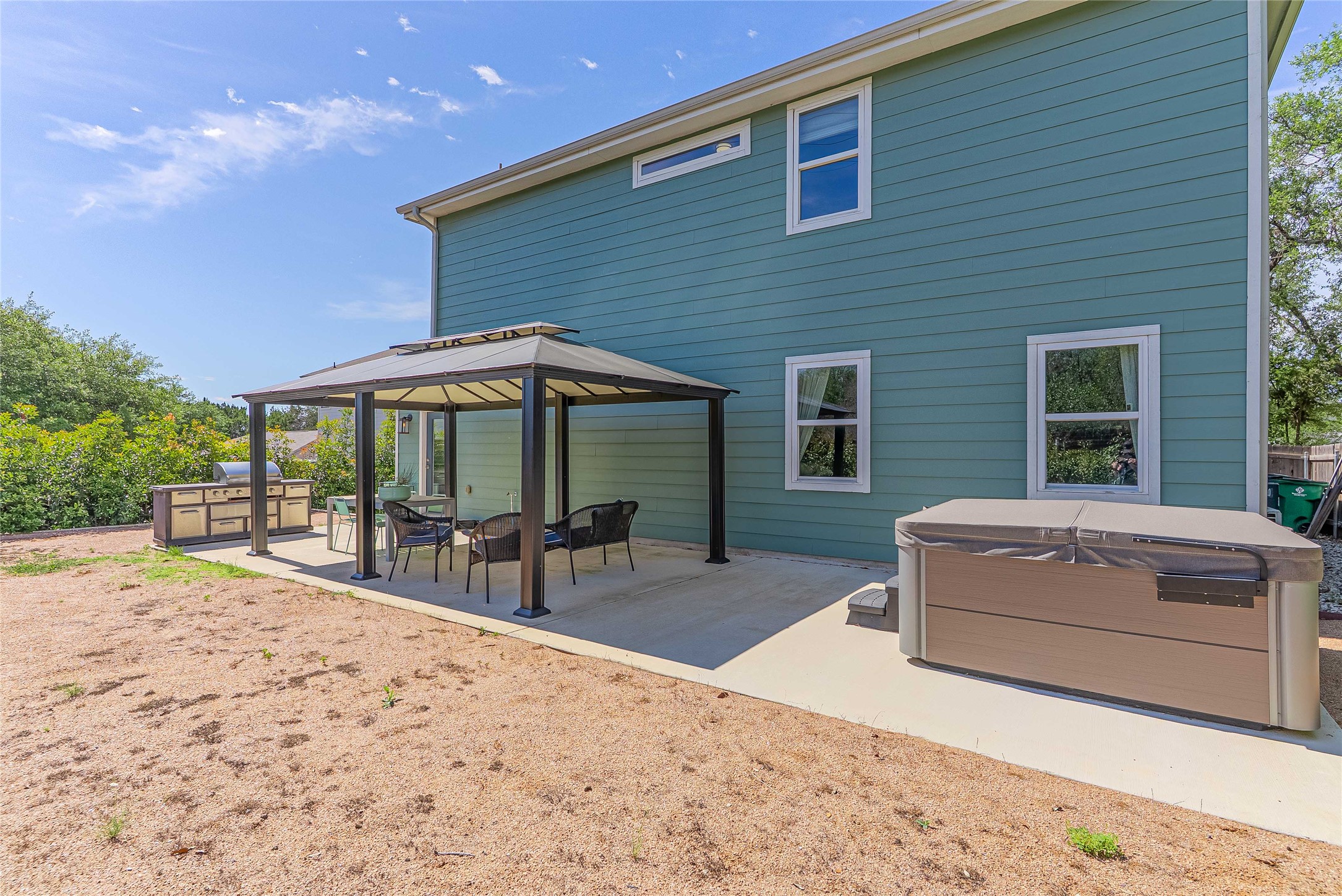 410 Summit Ridge Drive North Point Venture, TX 78645 - Photo 23 of 37 Extended patio and covered pavilion for outdoor entertaining