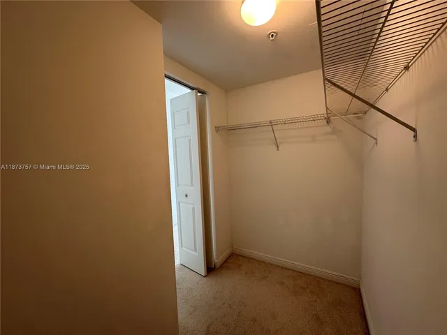 a bathroom with a sink and shower