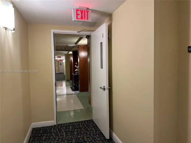 a view of a house with a swimming pool and a garden