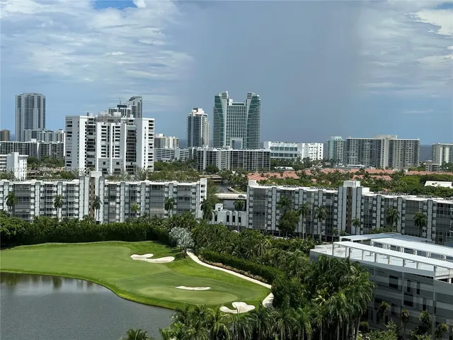 a view of a city with tall buildings