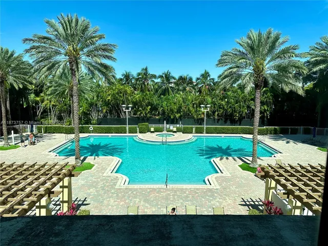a view of a swimming pool with a garden