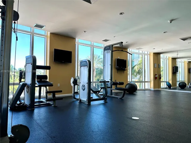 a view of a living room and a rug