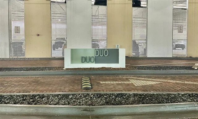 a view of a living room and a balcony