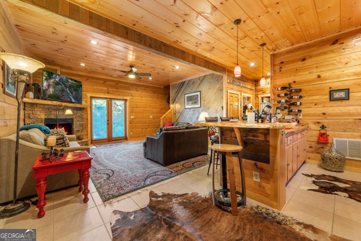 709 Laurel Creek Trail Blue Ridge, GA 30513 - Photo 15 of 87 a living room with lots of furniture and a table