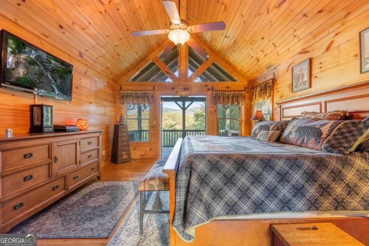 709 Laurel Creek Trail Blue Ridge, GA 30513 - Photo 59 of 87 a view of a bedroom with furniture