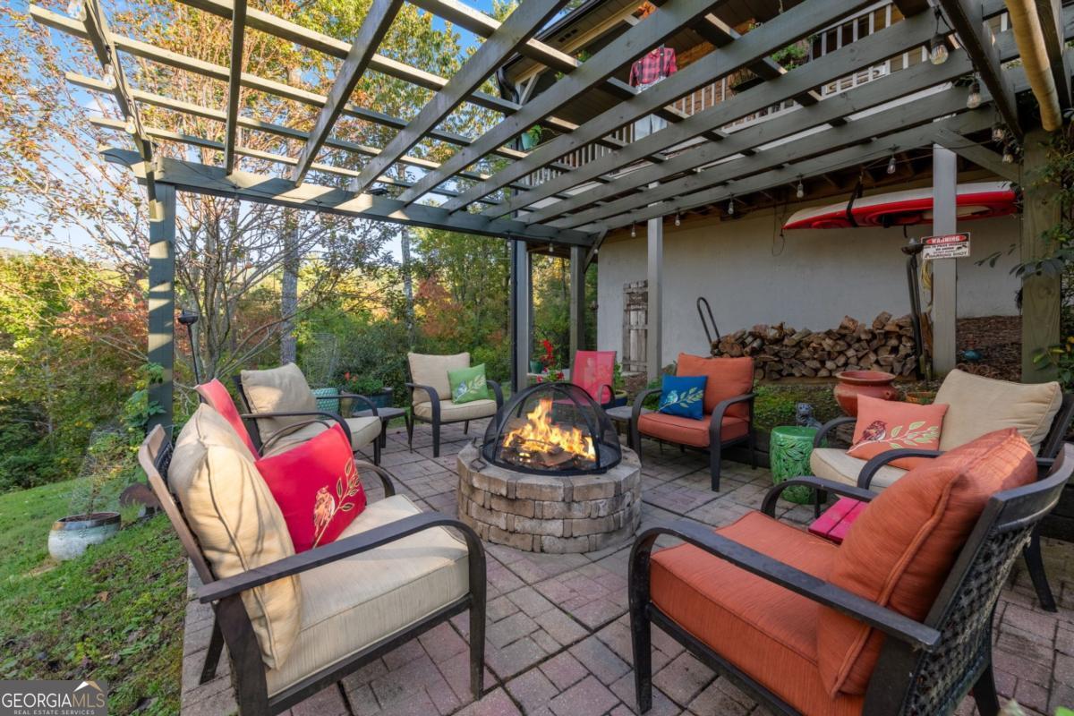 709 Laurel Creek Trail Blue Ridge, GA 30513 - Photo 81 of 87 a outdoor space with patio lots of furniture