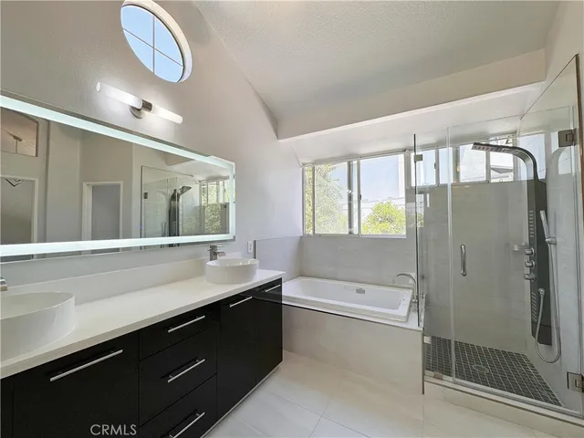 a view of cabinet and mirror