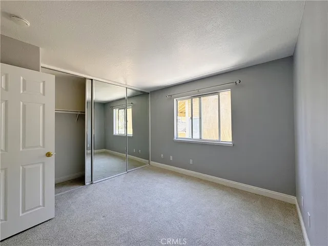a bathroom with a sink vanity and a mirror