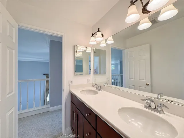a bathroom with a toilet a sink and a shower