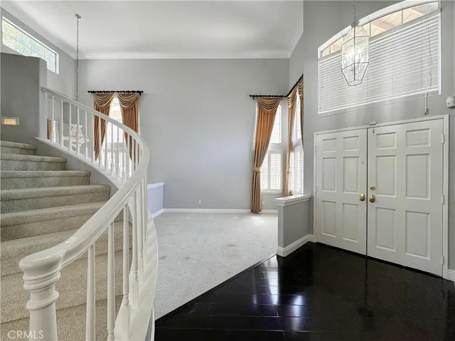 a view of entryway with wooden floor