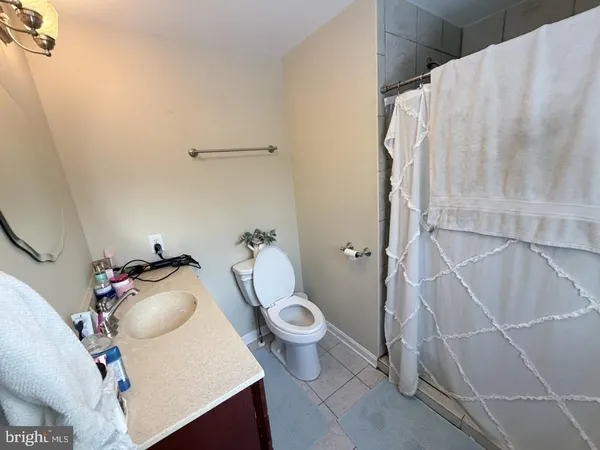 a bathroom with a sink and toilet